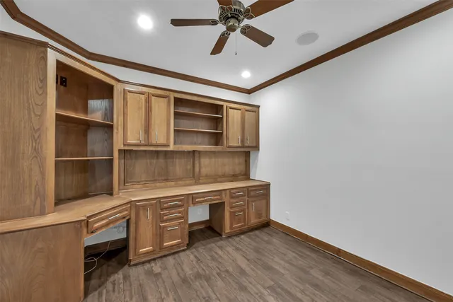 a room with wooden floors and closet
