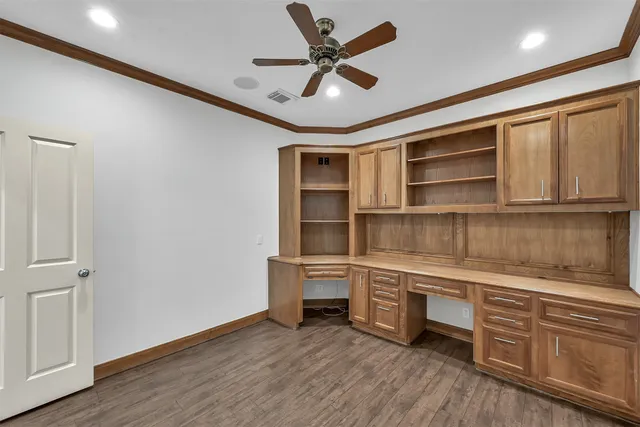 a bathroom with a shower sink vanity mirror and toilet