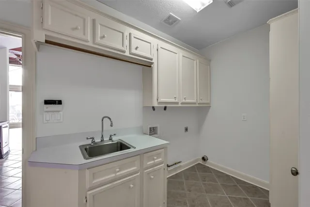 a view of a room with white walls