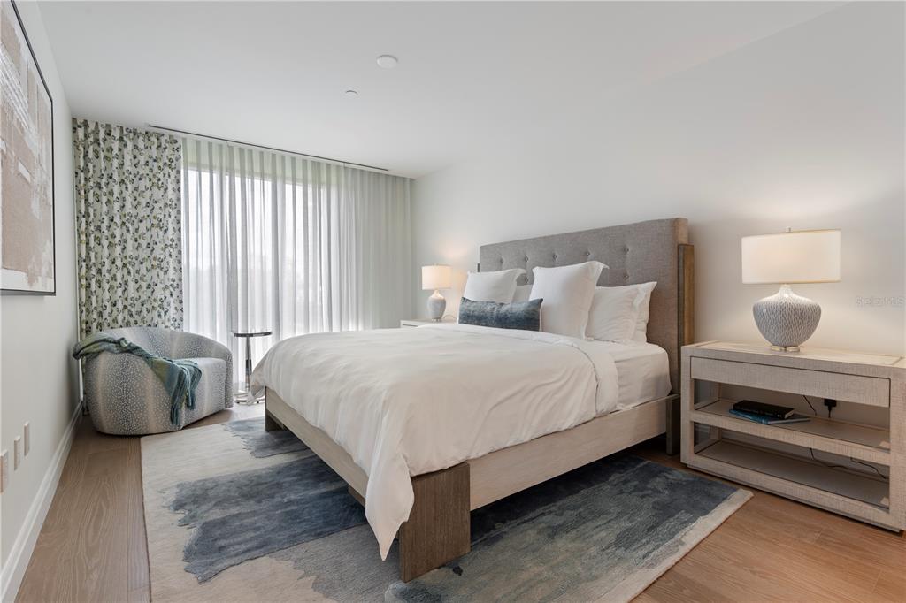 10160 Autumn Mist Lane, Unit 302 Orlando, FL 32836 - Photo 17 of 46 a bedroom with a bed and window