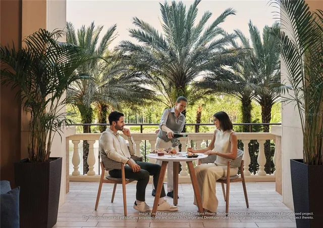 a view of a dinning table and chairs in a patio