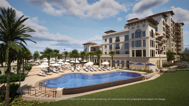 a view of a house with swimming pool and sitting area