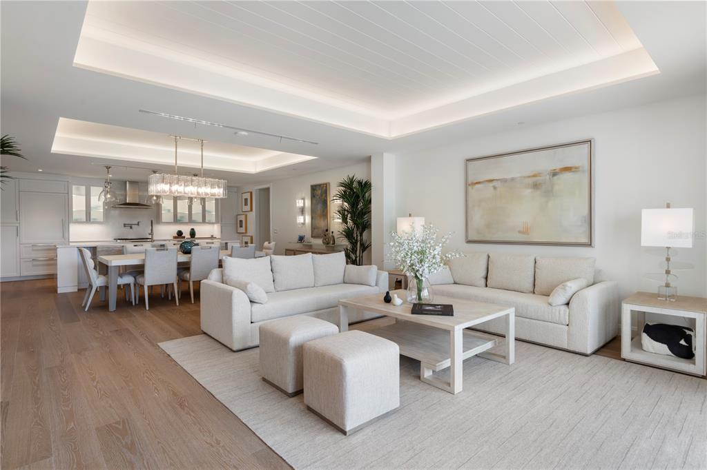 10160 Autumn Mist Lane, Unit 302 Orlando, FL 32836 - Photo 4 of 46 a living room with furniture and a wooden floor