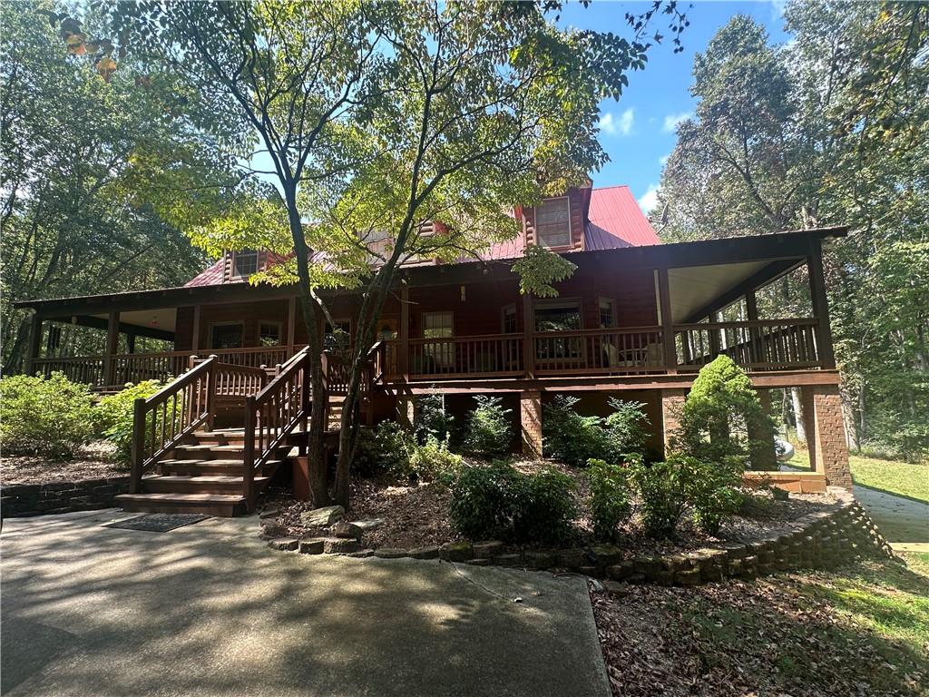 8275 Pea Ridge Road Cornelia, GA 30531 - Photo 2 of 52 a view of a house