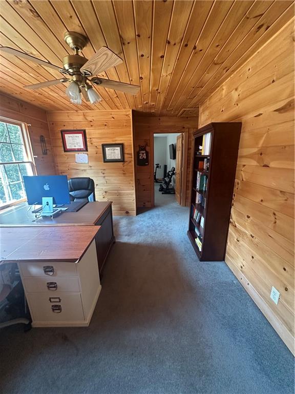 8275 Pea Ridge Road Cornelia, GA 30531 - Photo 24 of 52 a living room with furniture and a flat screen tv