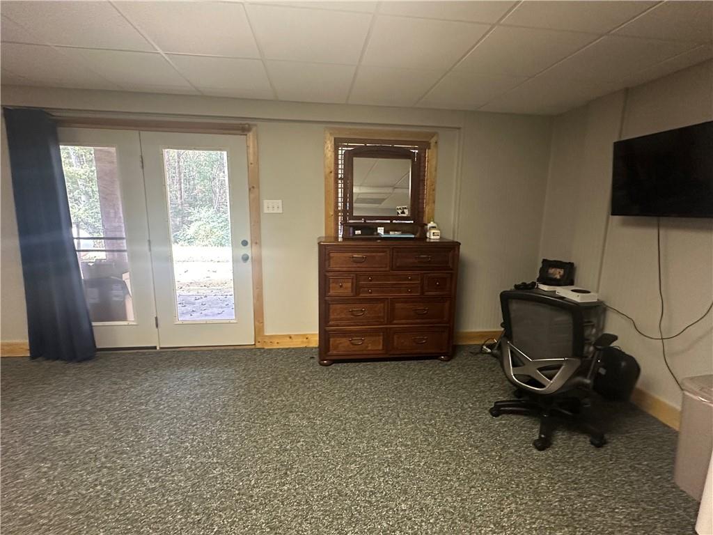 8275 Pea Ridge Road Cornelia, GA 30531 - Photo 26 of 52 a room with furniture and a flat screen tv