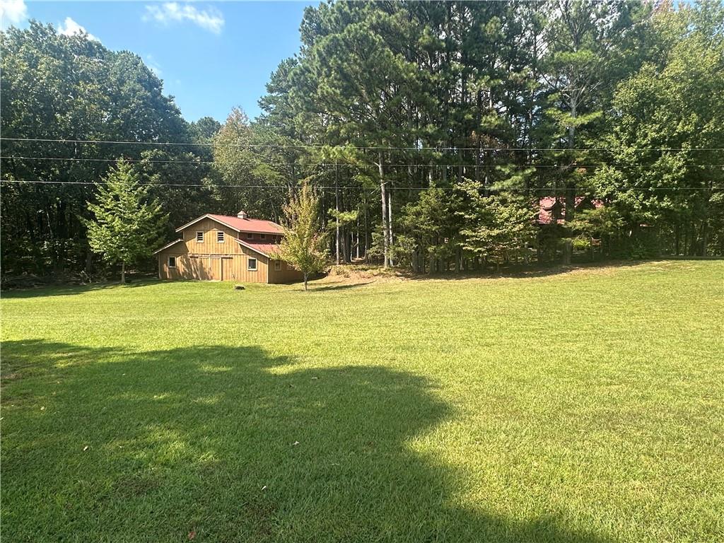 8275 Pea Ridge Road Cornelia, GA 30531 - Photo 47 of 52 a view of swimming pool and lake view