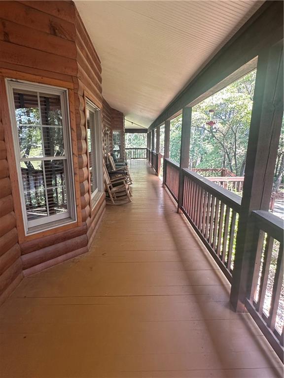 8275 Pea Ridge Road Cornelia, GA 30531 - Photo 6 of 52 a view of a balcony with chairs