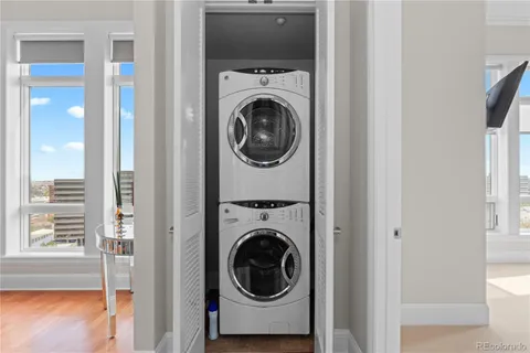 a view of a hallway with washer and dryer