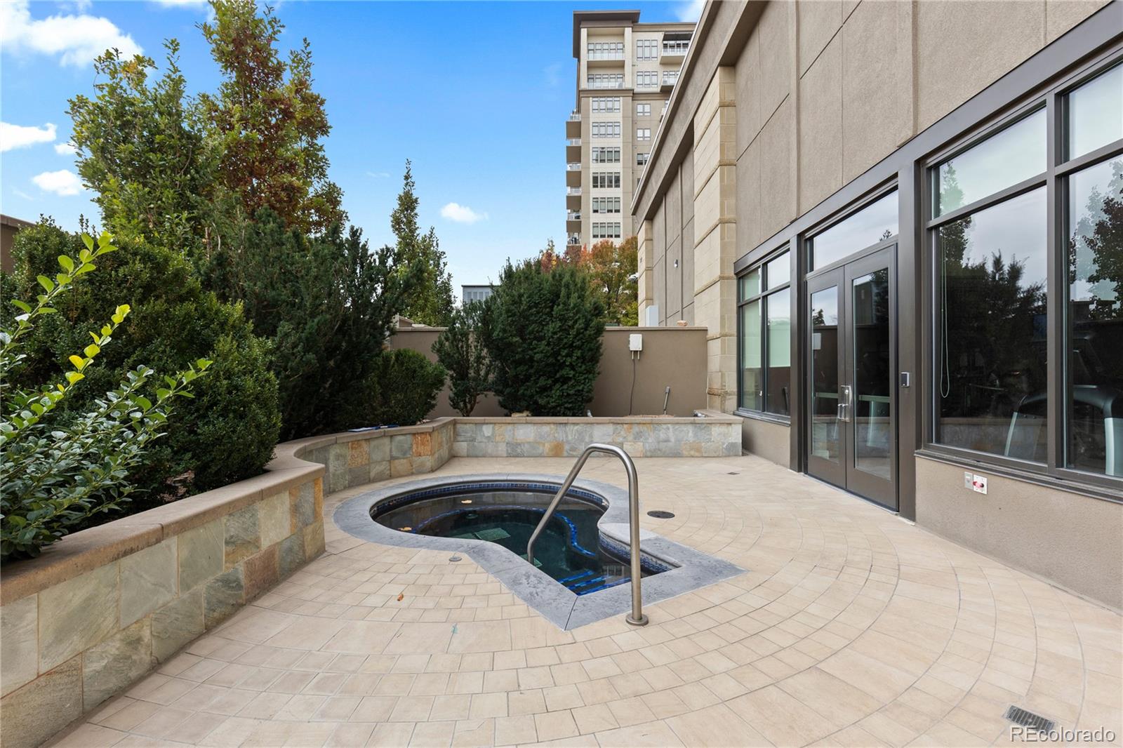 7600 Land Mark Way, Unit 1411 Greenwood Village, CO 80111 - Photo 43 of 50 a view of a swimming pool with a lounge chair