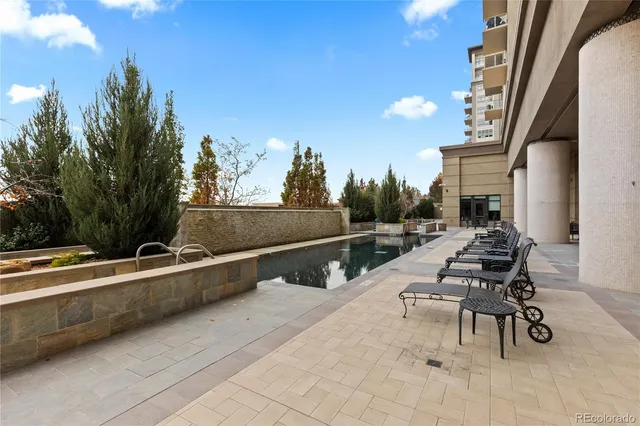 a view of a terrace with furniture and sitting area