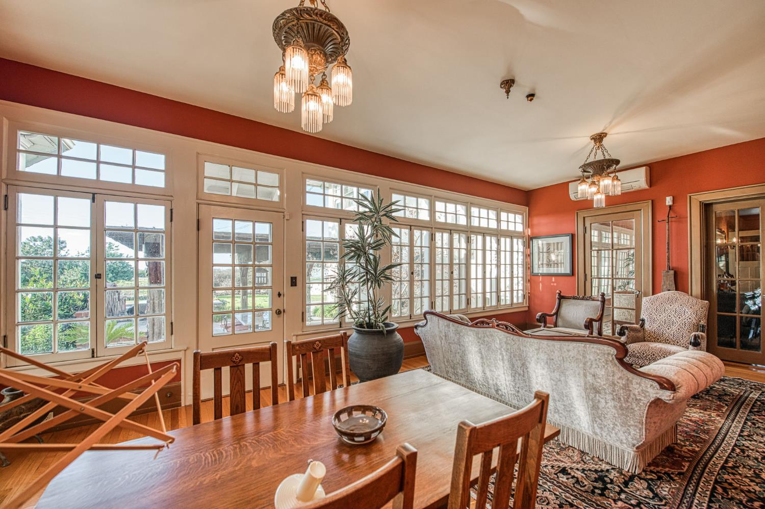 9486 East Lincoln Avenue Del Rey, CA 93616 - Photo 12 of 77 a view of a dining room with furniture large windows and wooden floor