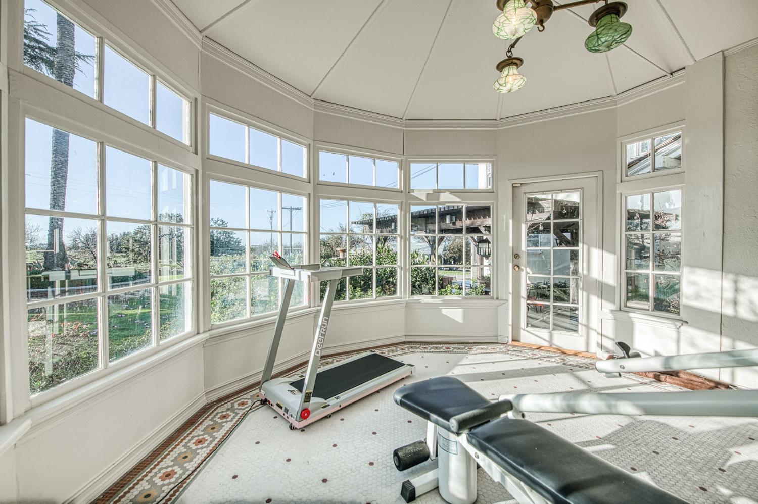 9486 East Lincoln Avenue Del Rey, CA 93616 - Photo 15 of 77 a view of a room with gym equipment