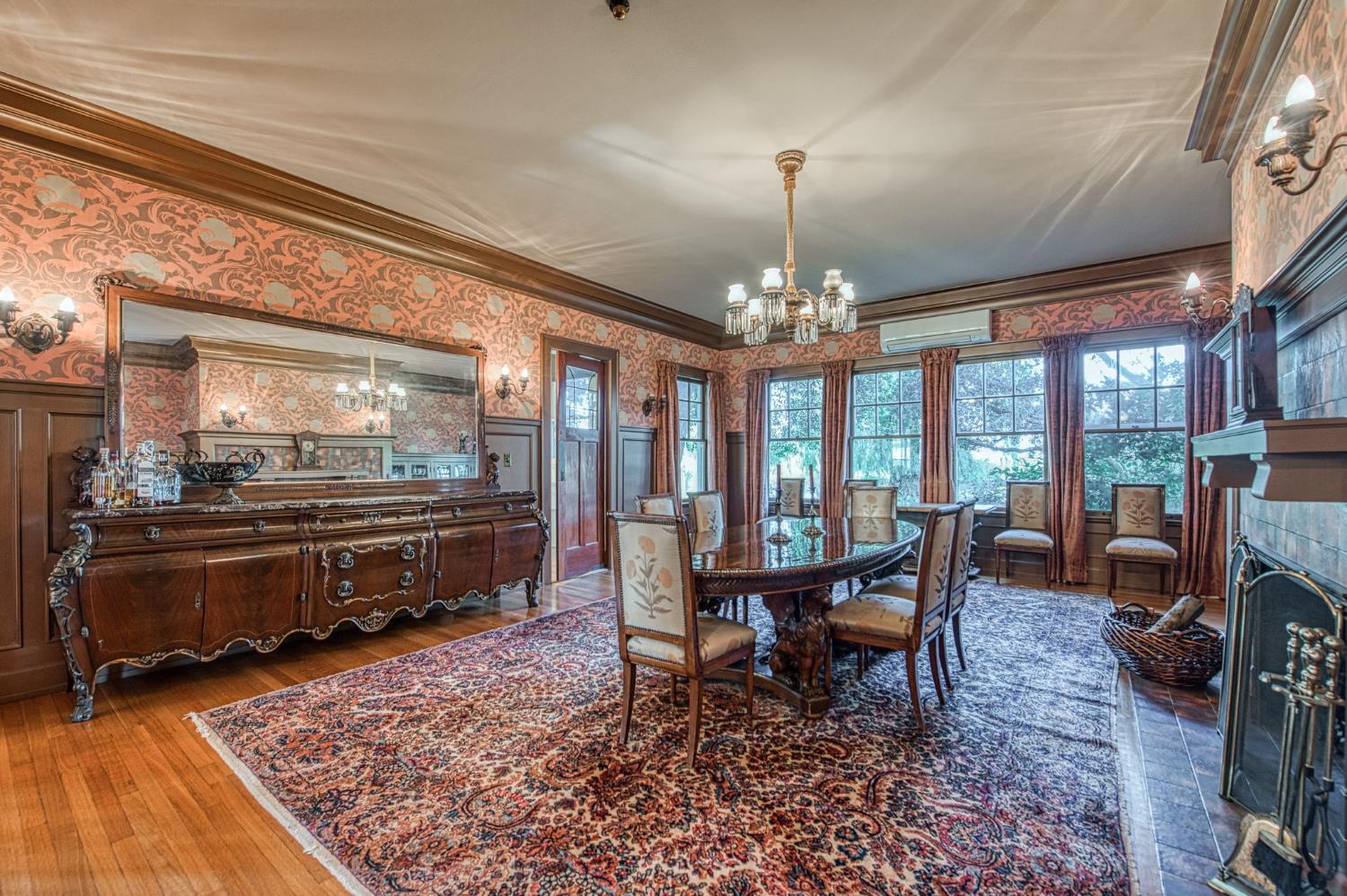 9486 East Lincoln Avenue Del Rey, CA 93616 - Photo 16 of 77 a view of a dining room with furniture a chandelier and wooden floor