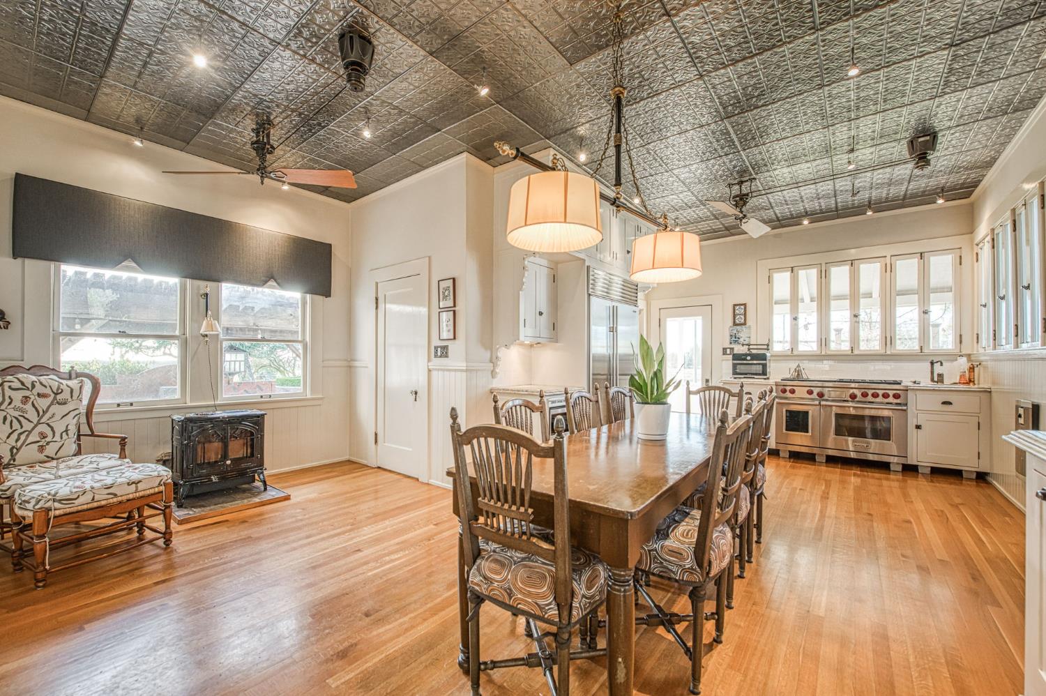 9486 East Lincoln Avenue Del Rey, CA 93616 - Photo 25 of 77 a view of a dining room with furniture window and wooden floor