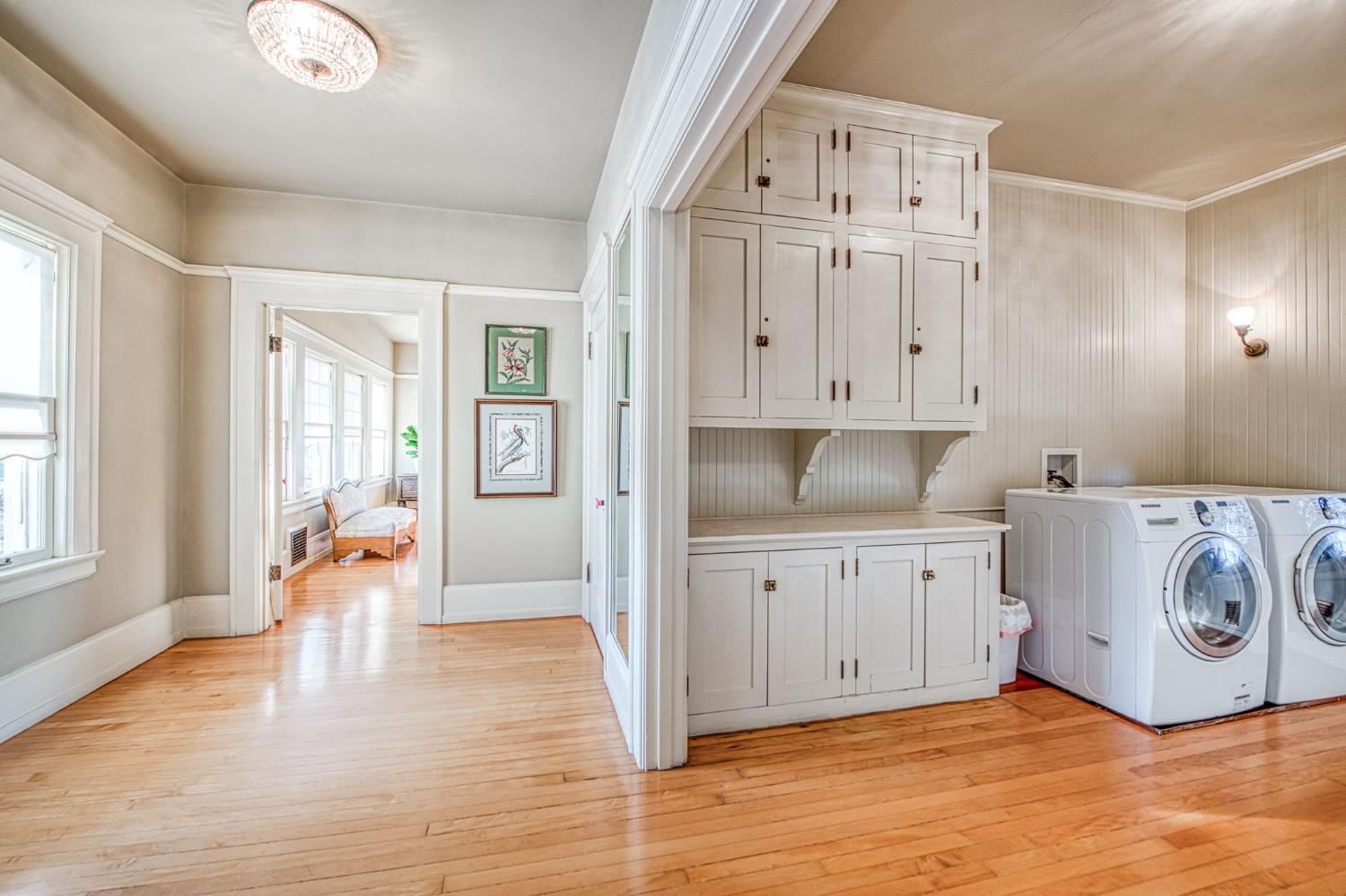 9486 East Lincoln Avenue Del Rey, CA 93616 - Photo 40 of 77 a view of a kitchen with furniture and wooden floor