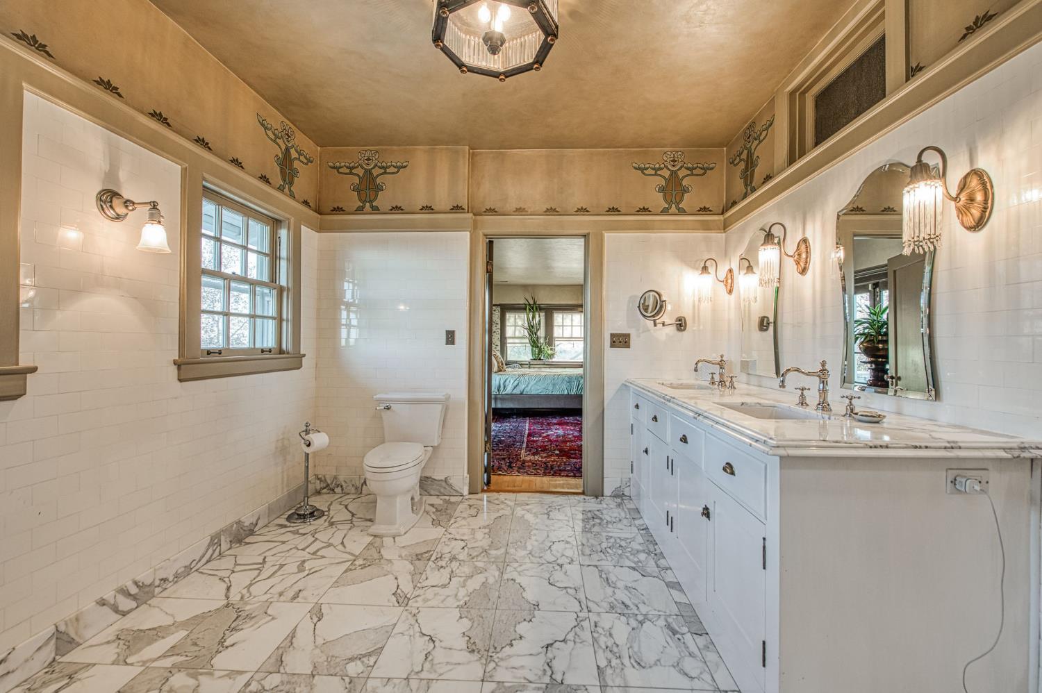 9486 East Lincoln Avenue Del Rey, CA 93616 - Photo 45 of 77 a bathroom with a sink a vanity and a toilet