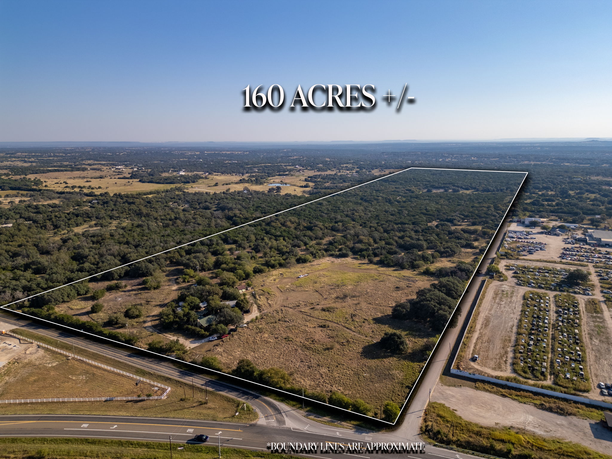 Aerial overview of property's location with property parcel outlined