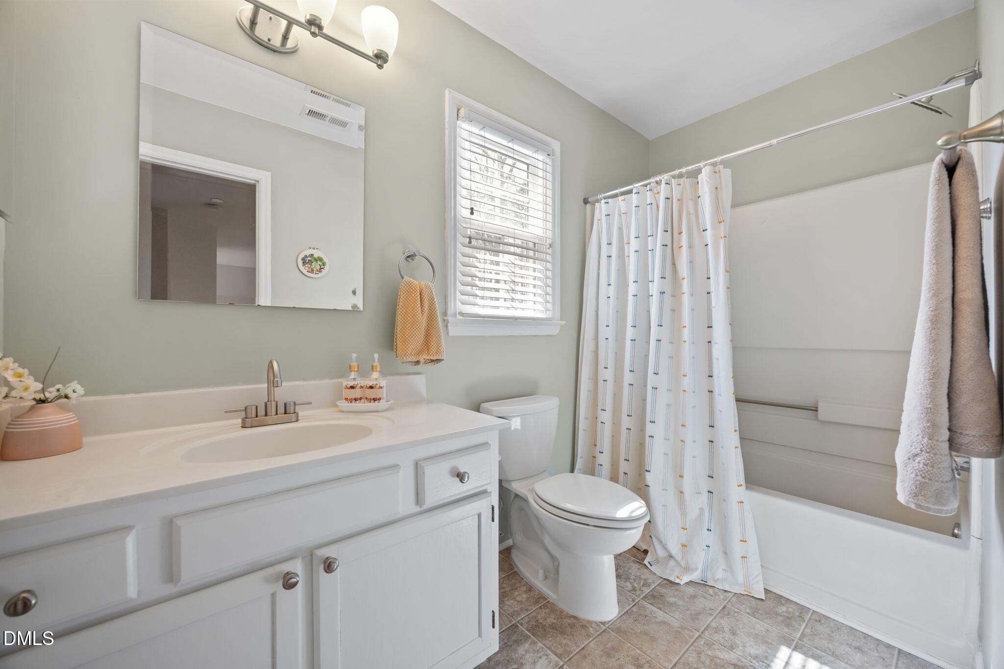 5240 Fairmead Circle Raleigh, NC 27613 - Photo 23 of 52 a bathroom with a sink toilet and shower