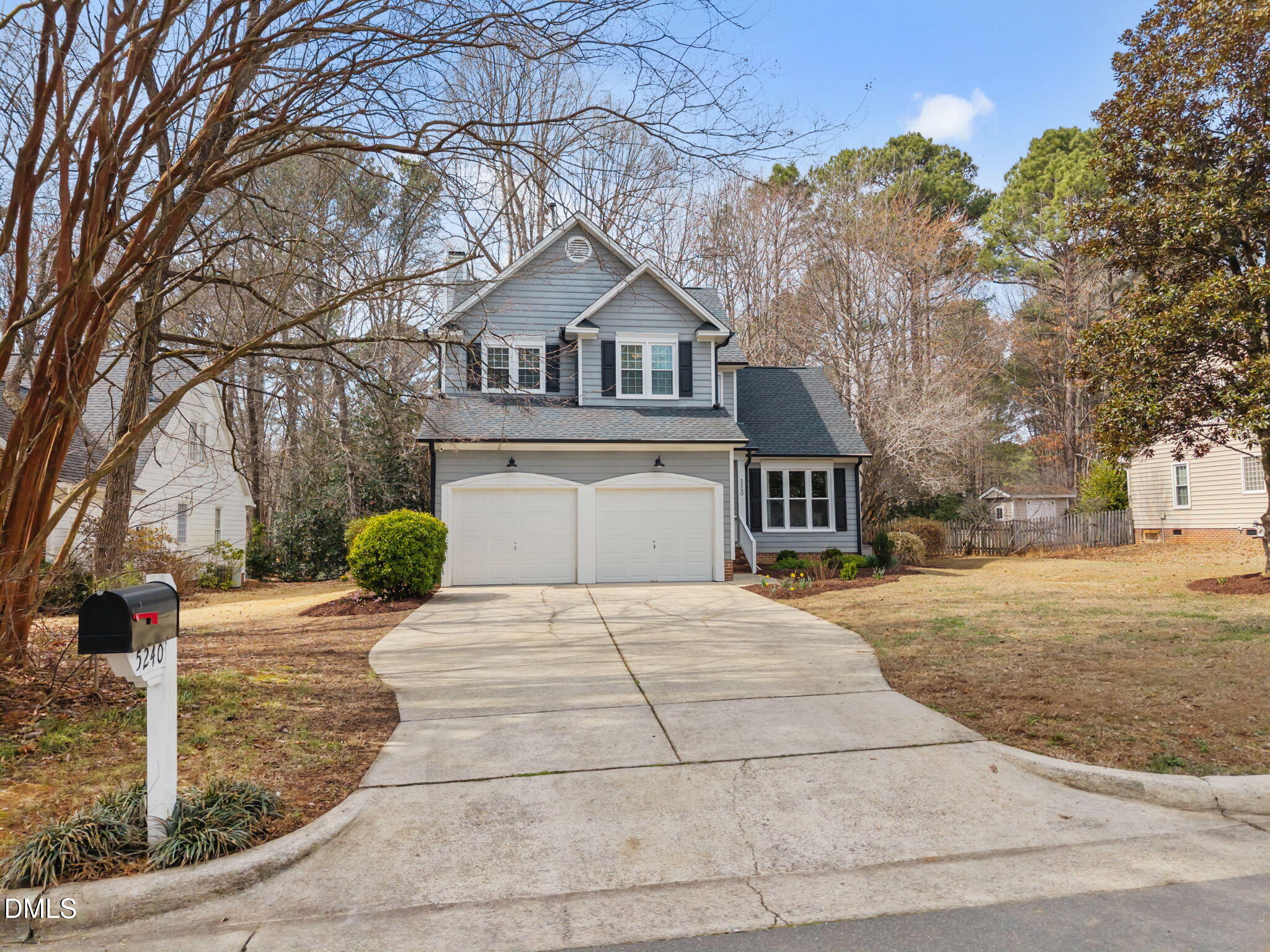 5240 Fairmead Circle Raleigh, NC 27613 - Photo 3 of 52 a front view of a house with a yard