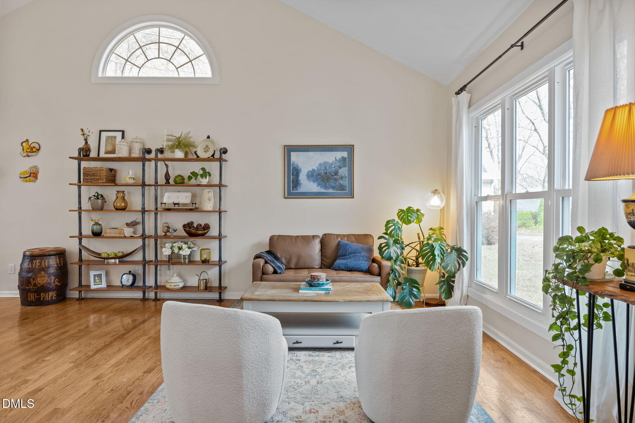 5240 Fairmead Circle Raleigh, NC 27613 - Photo 32 of 52 a living room with furniture and a potted plant