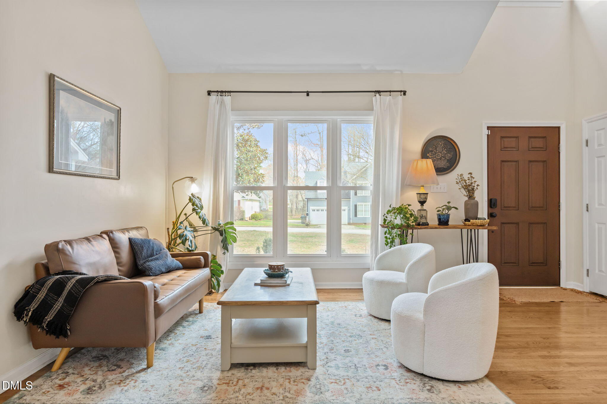 5240 Fairmead Circle Raleigh, NC 27613 - Photo 34 of 52 a living room with furniture and a large window