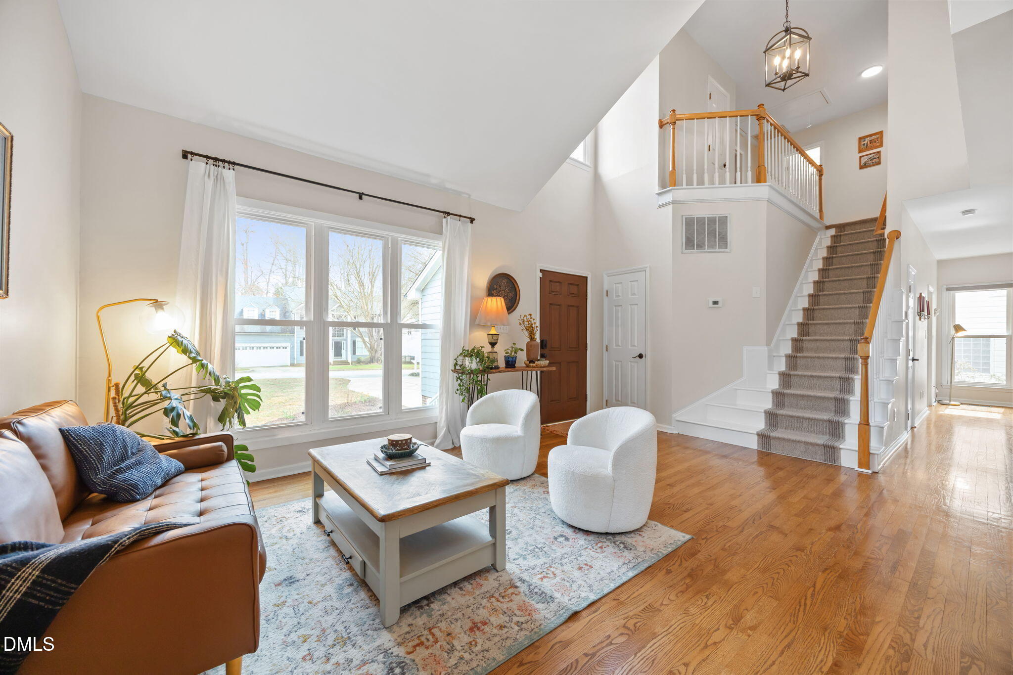 5240 Fairmead Circle Raleigh, NC 27613 - Photo 35 of 52 a living room with furniture and a large window