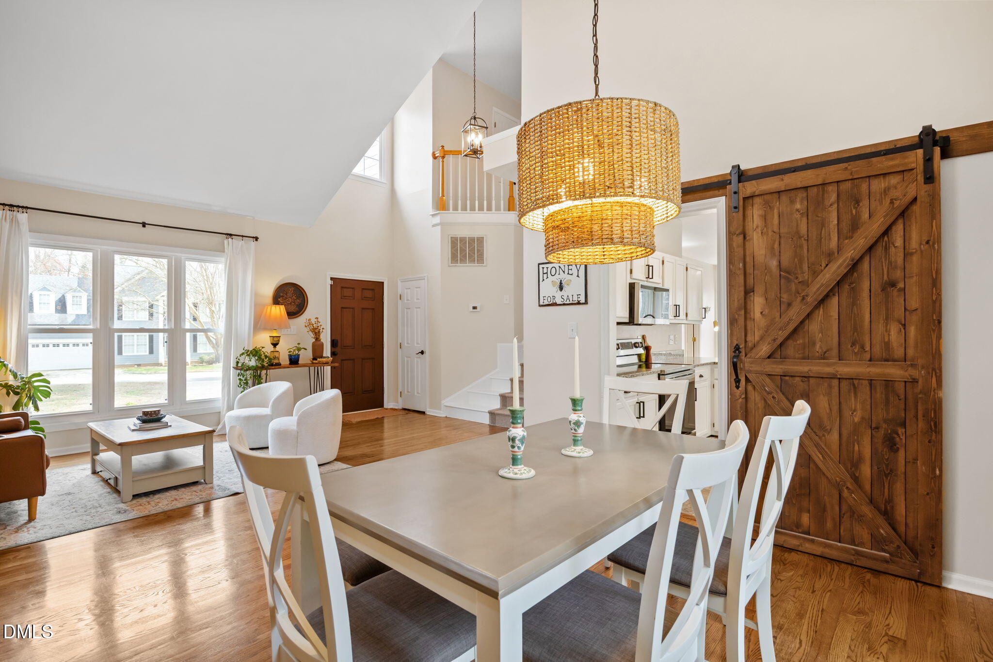 5240 Fairmead Circle Raleigh, NC 27613 - Photo 38 of 52 a view of a dining room with furniture window and wooden floor