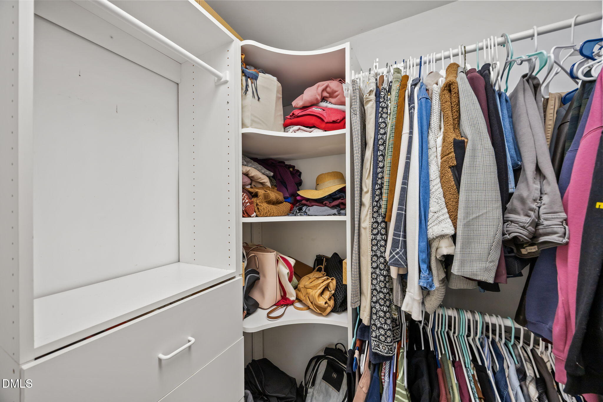5240 Fairmead Circle Raleigh, NC 27613 - Photo 49 of 52 a view of walk in closet with clothes and shoes