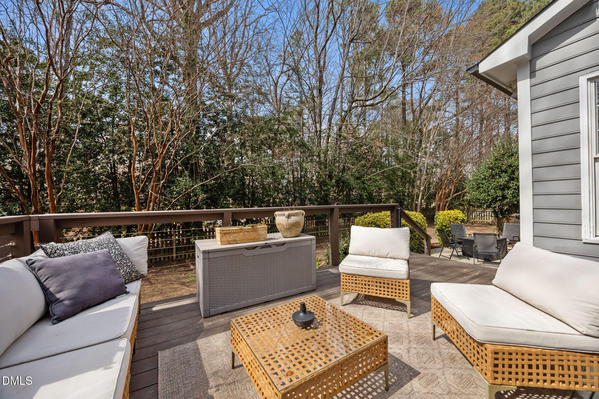 5240 Fairmead Circle Raleigh, NC 27613 - Photo 50 of 52 a balcony with couches and a potted plant on a table