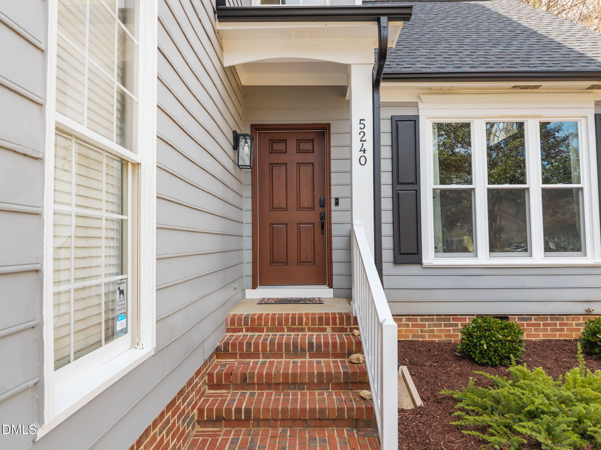 5240 Fairmead Circle Raleigh, NC 27613 - Photo 7 of 52 a front view of a house with a porch