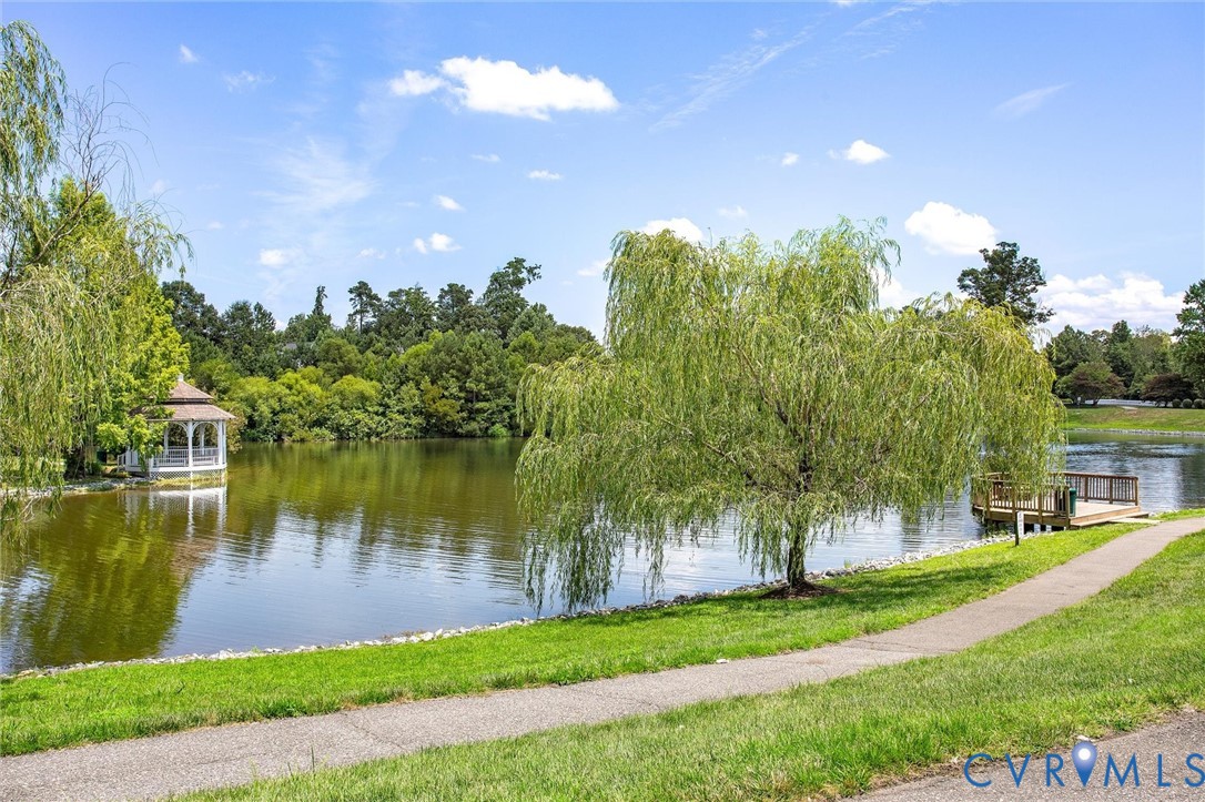 13424 Tipple Point Road Midlothian, VA 23114 - Photo 3 of 11 a view of a lake with a house in the background