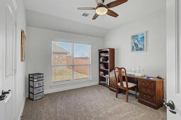 a room with furniture and a window