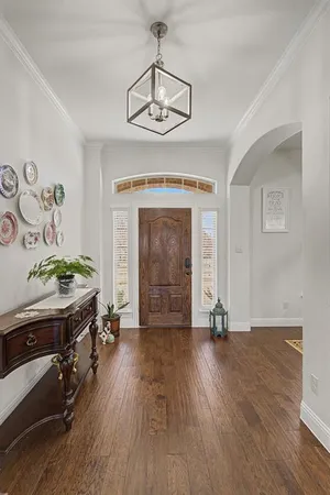 a view of livingroom with hardwood floor and a ceiling fan