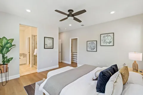 a bedroom that has a bed and a window