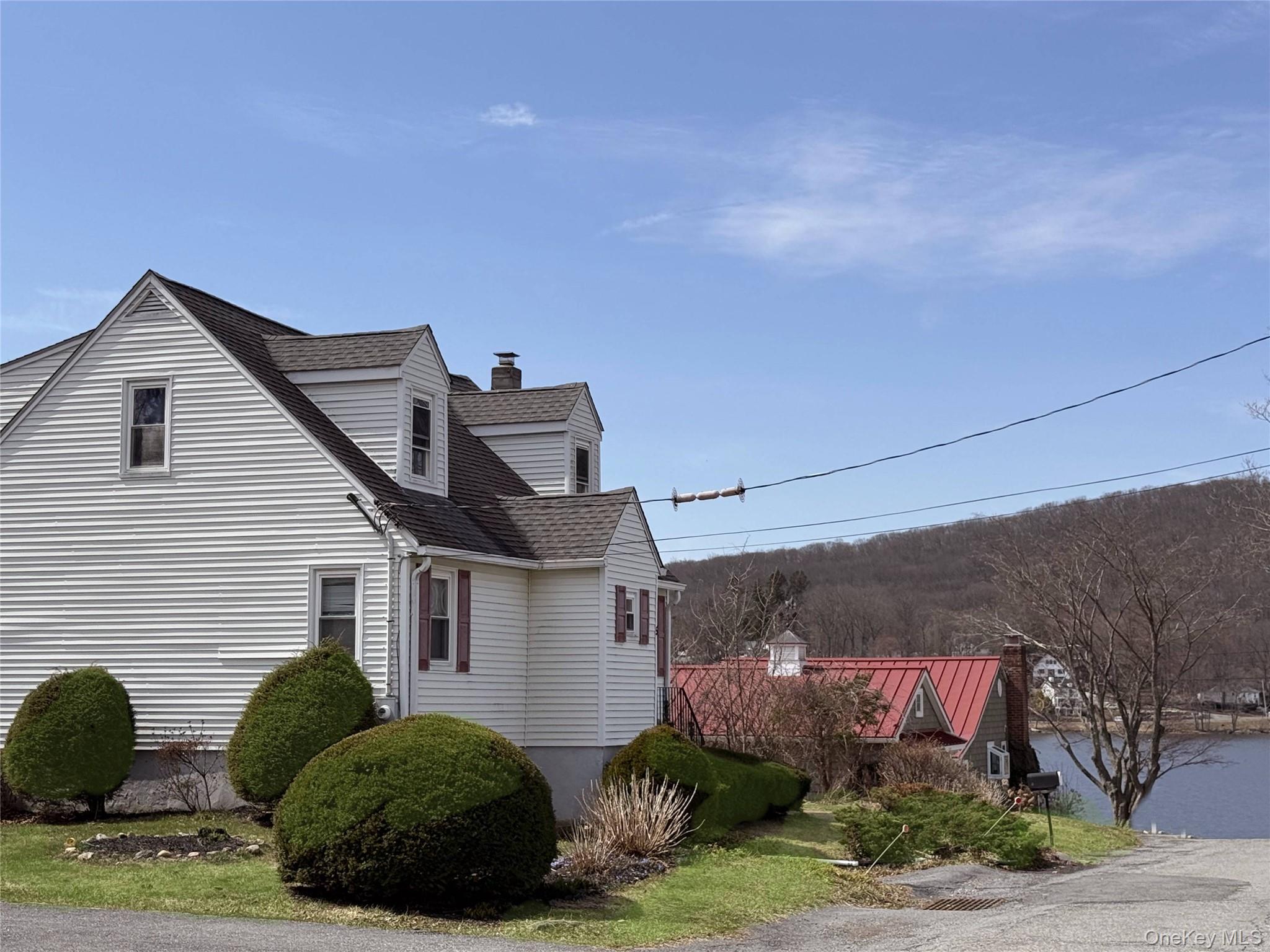 5 Lockwood Road Carmel, NY 10512 - Photo 1 of 1 The lovely home is only steps away from the Lake