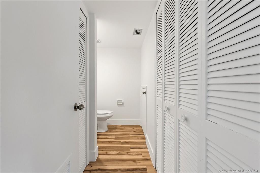 762 Northwest 10th Terrace Stuart, FL 34994 - Photo 20 of 41 a view of a bathroom from the hallway