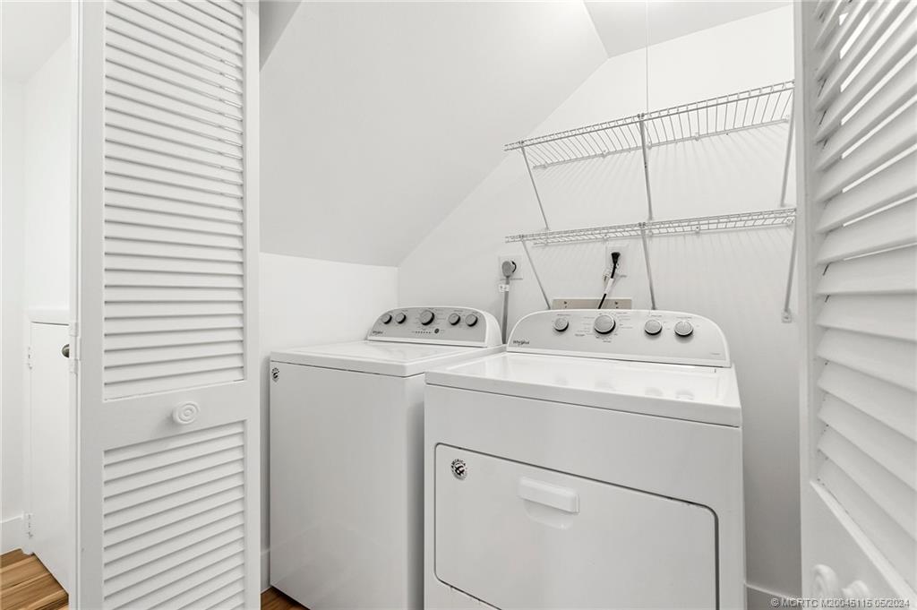 762 Northwest 10th Terrace Stuart, FL 34994 - Photo 21 of 41 a utility room with dryer and washer