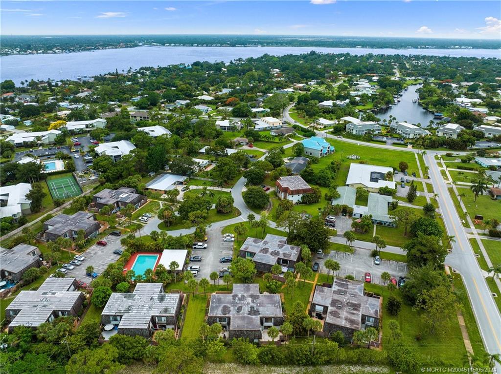 762 Northwest 10th Terrace Stuart, FL 34994 - Photo 40 of 41 an aerial view of residential houses with outdoor space