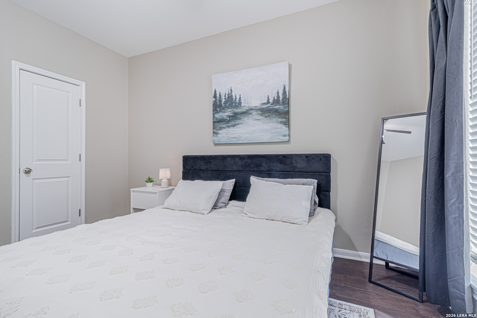 1815 Indian Paint Brush Road San Antonio, TX 78232 - Photo 28 of 35 a bedroom with a bed and wall painting