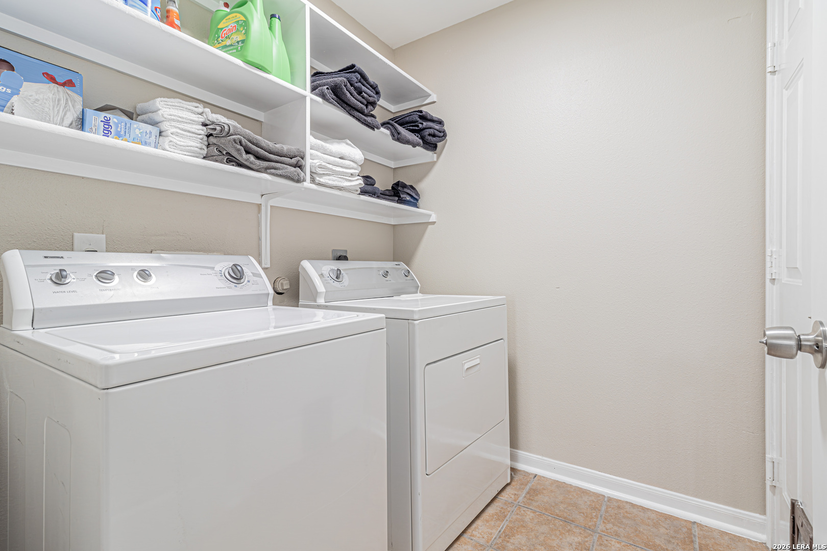 1815 Indian Paint Brush Road San Antonio, TX 78232 - Photo 32 of 35 a utility room with dryer and washer
