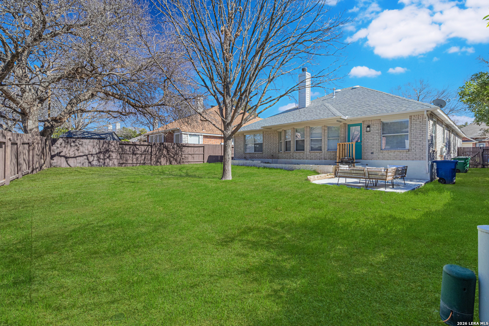 1815 Indian Paint Brush Road San Antonio, TX 78232 - Photo 34 of 35 a front view of a house with garden and trees