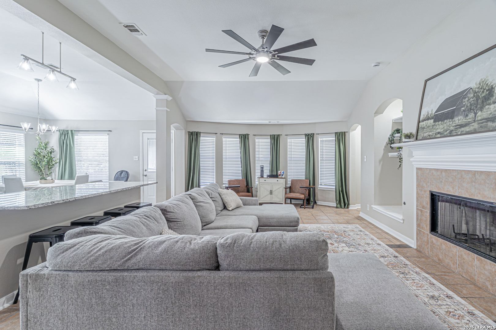 1815 Indian Paint Brush Road San Antonio, TX 78232 - Photo 7 of 35 a living room with furniture and a fireplace
