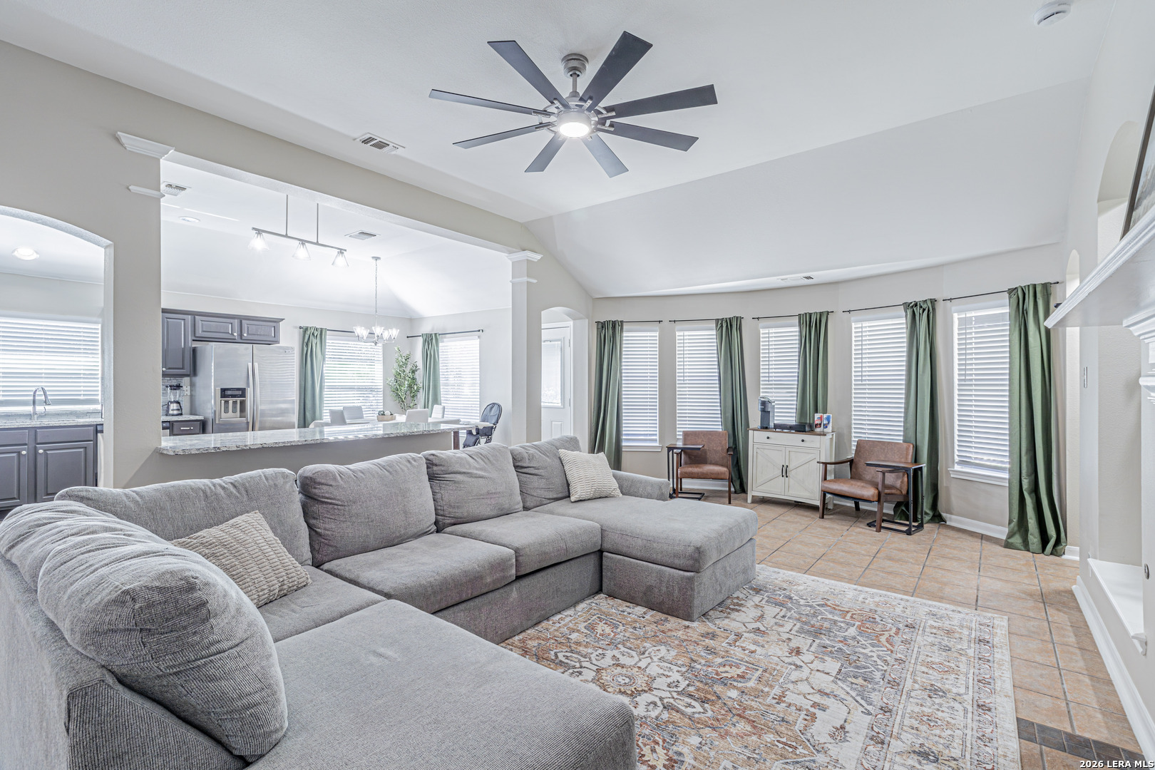 1815 Indian Paint Brush Road San Antonio, TX 78232 - Photo 8 of 35 a living room with furniture and large windows