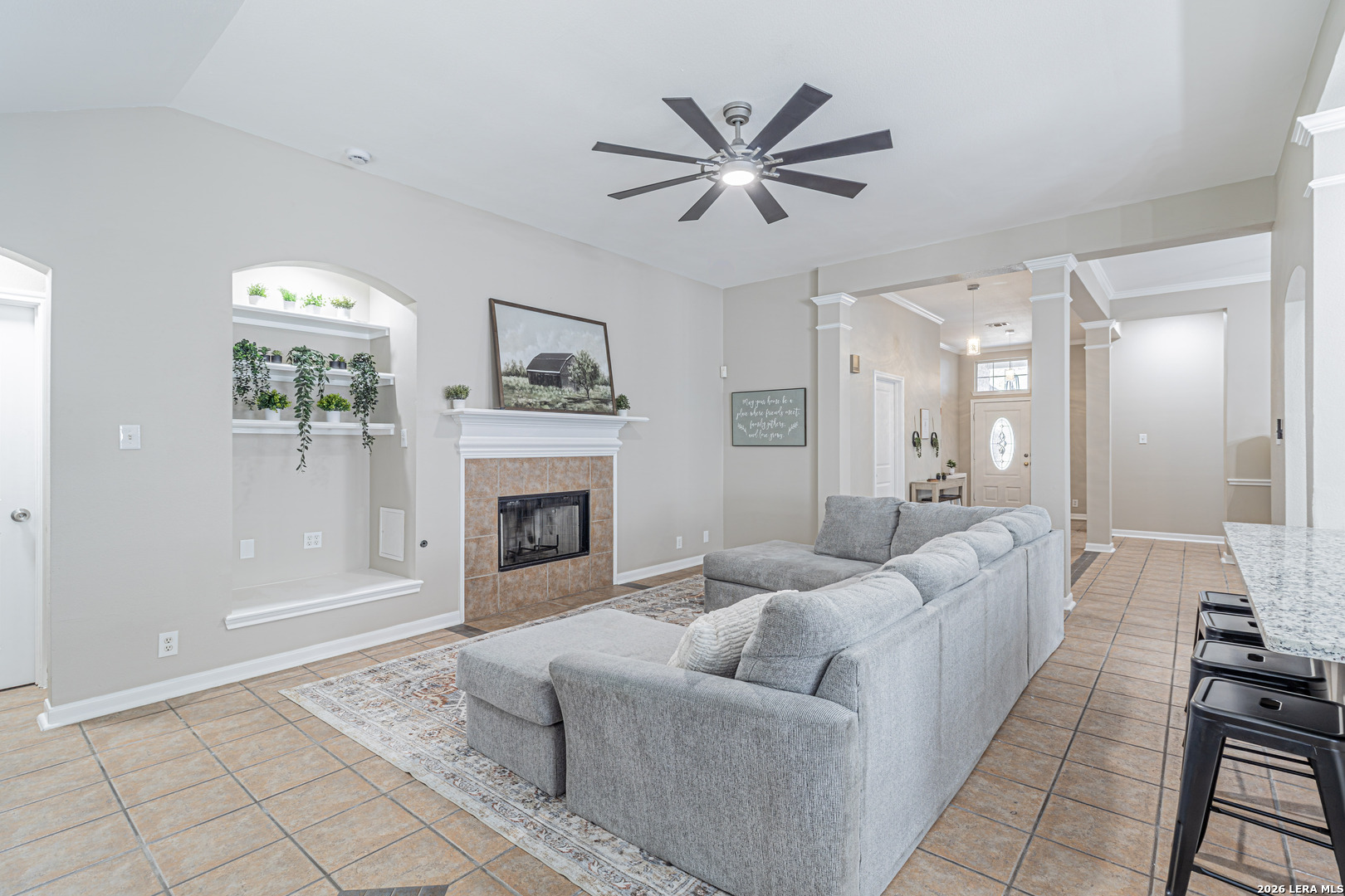 1815 Indian Paint Brush Road San Antonio, TX 78232 - Photo 10 of 35 a living room with furniture and a fireplace