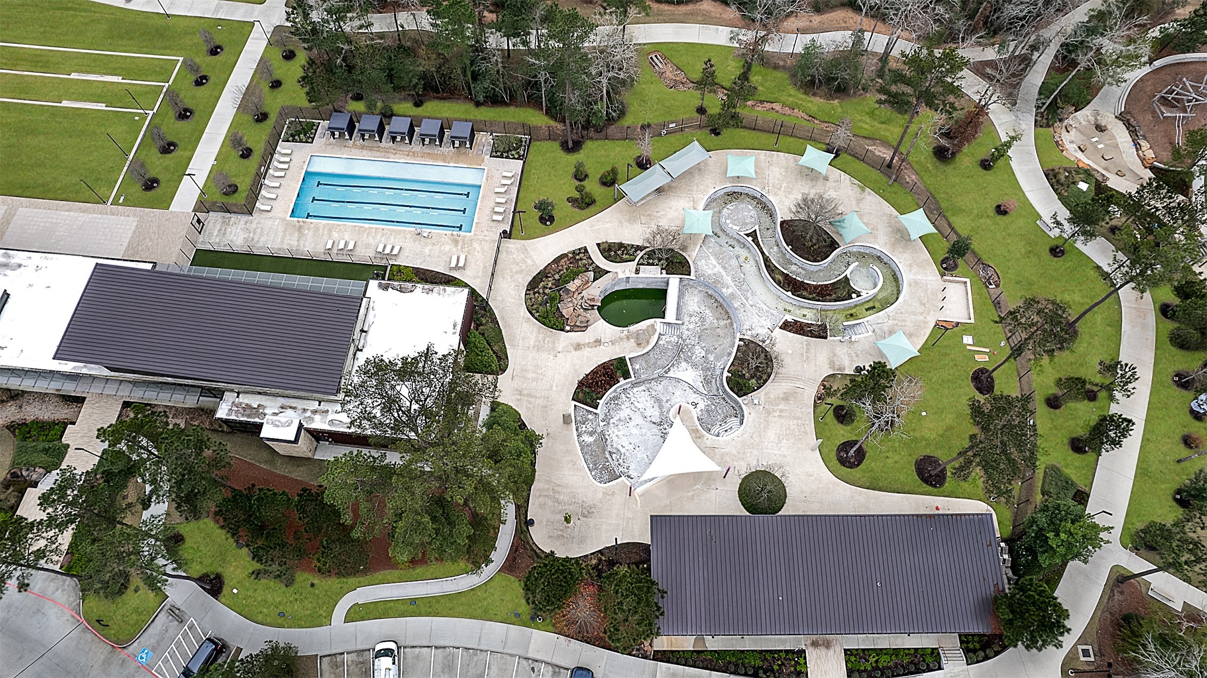 144 Red Cascade Trail Conroe, TX 77318 - Photo 26 of 34 Amenities! You should see it in the summer when the pool is full of water.