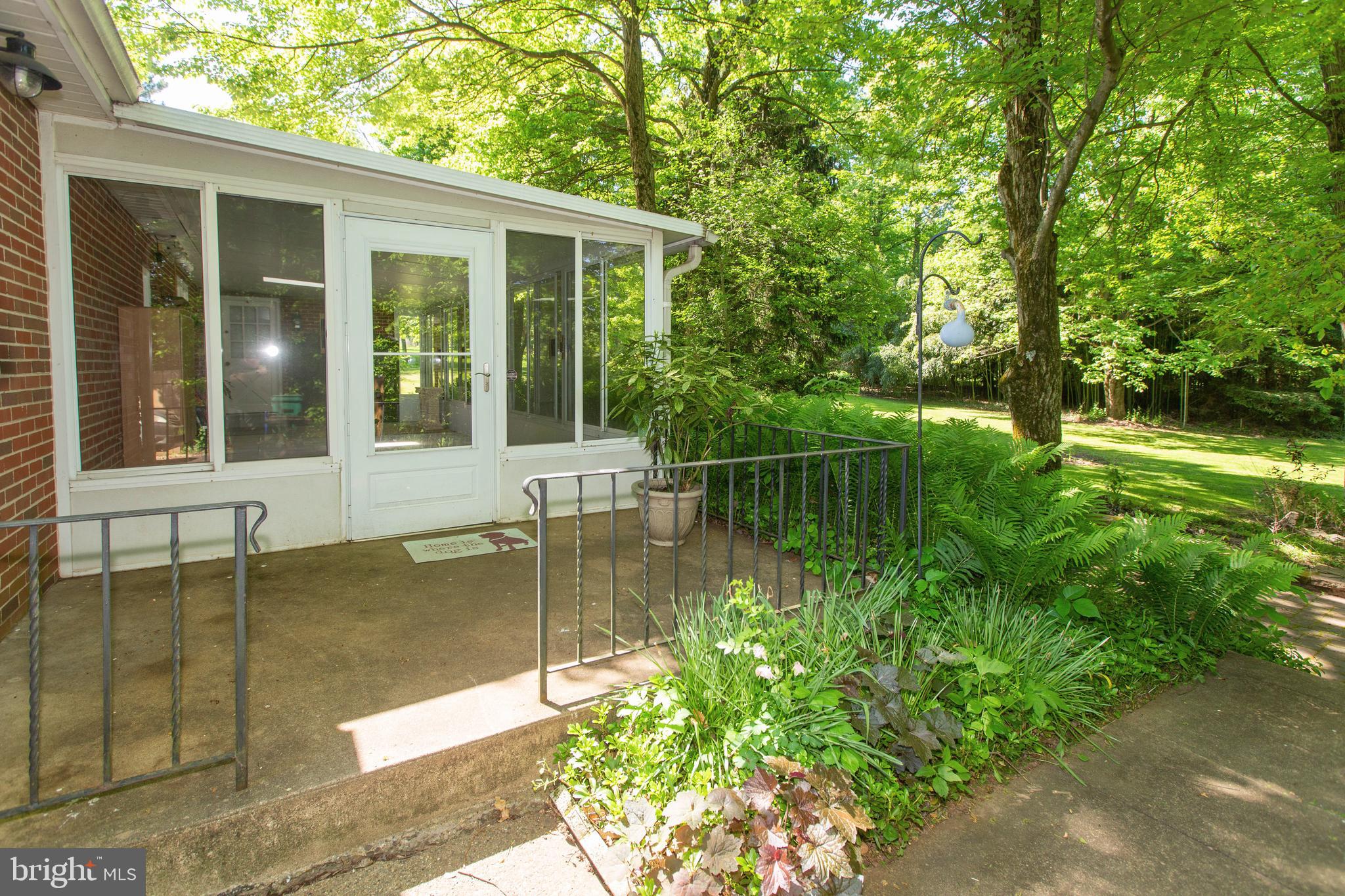 Side Patio and Sun Room