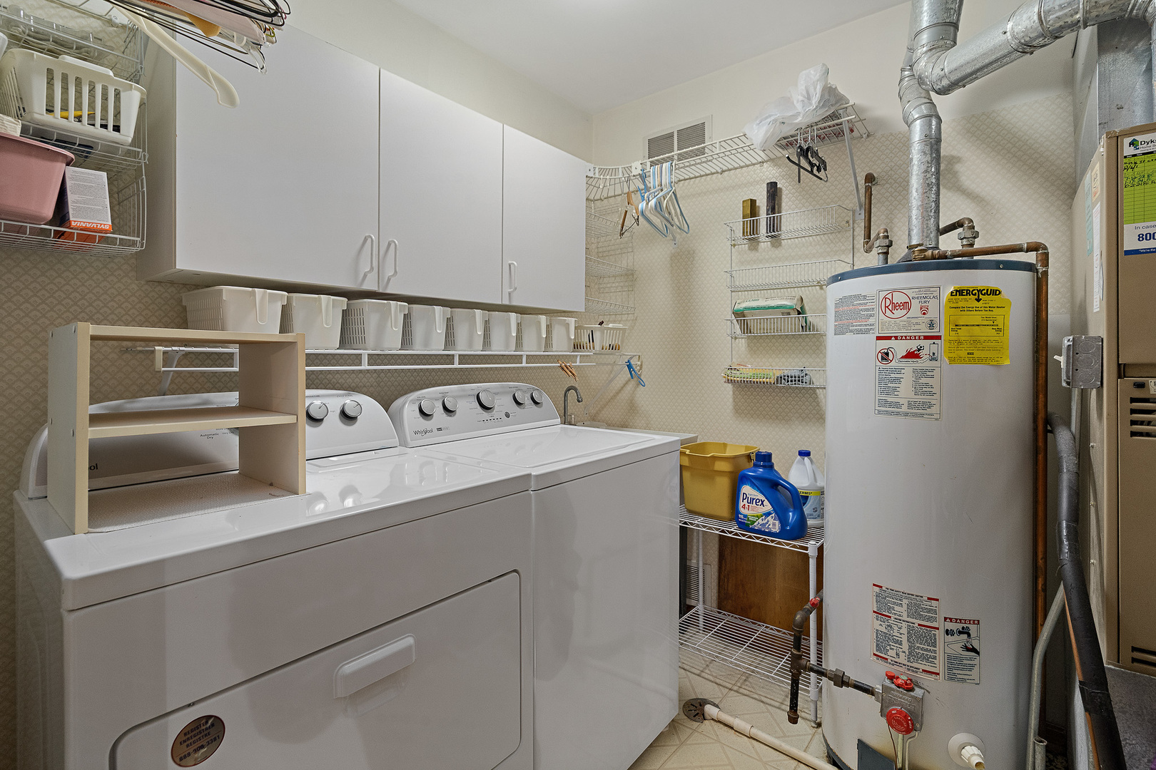 18431 Pine Cone Drive, Unit 1 Tinley Park, IL 60477 - Photo 19 of 33 a utility room with refrigerator and washer