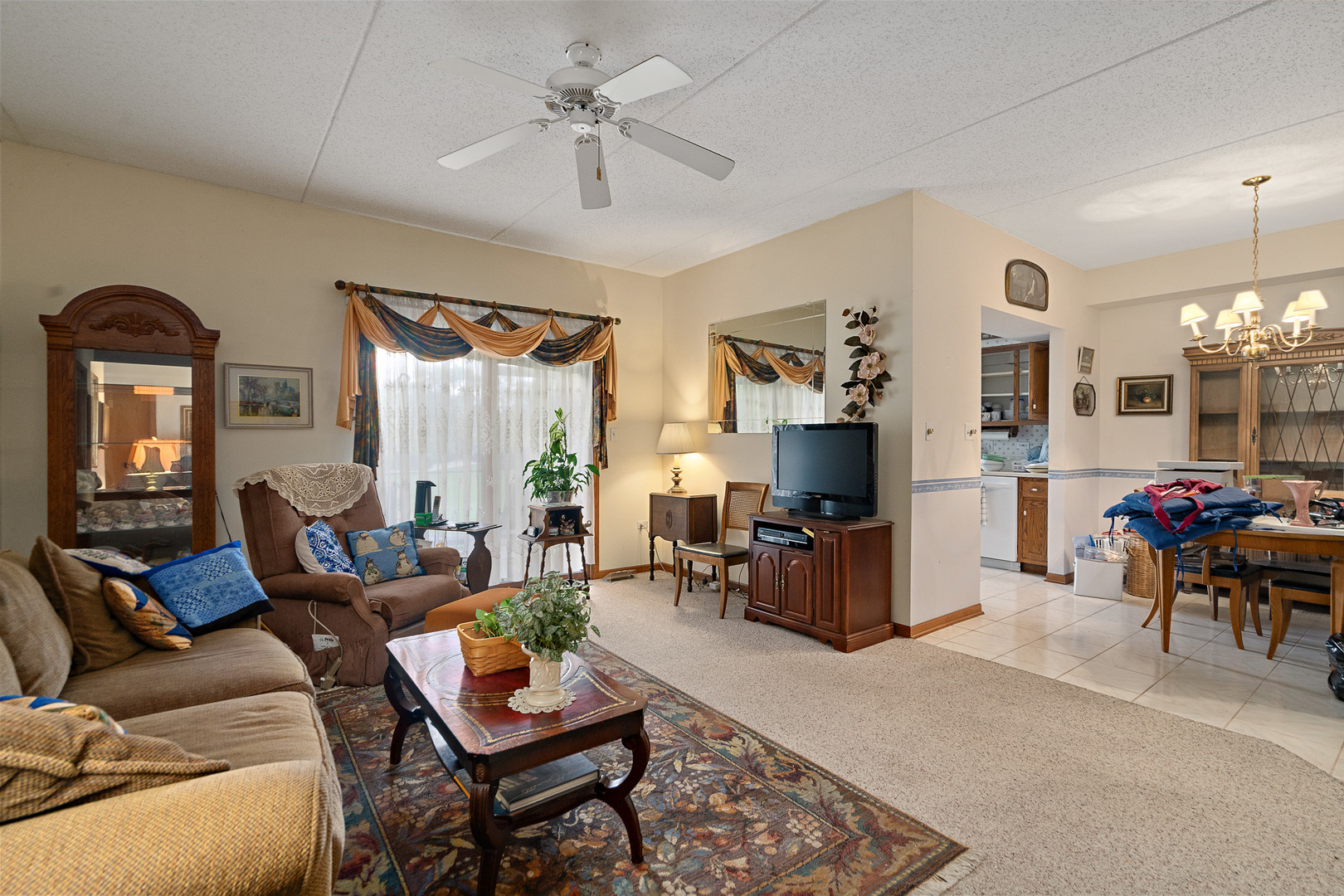 18431 Pine Cone Drive, Unit 1 Tinley Park, IL 60477 - Photo 4 of 33 a living room with furniture and wooden floor