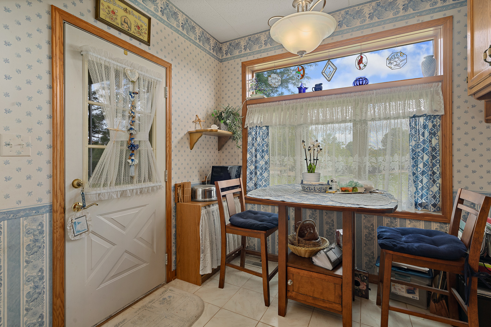 18431 Pine Cone Drive, Unit 1 Tinley Park, IL 60477 - Photo 9 of 33 a view of a dining room with furniture